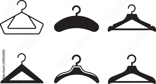 Collection of various types of clothes hangers on white background