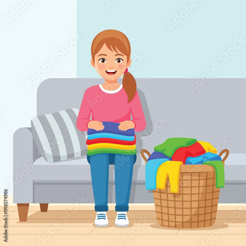 Smiling girl folding colorful clothes next to a laundry basket.
