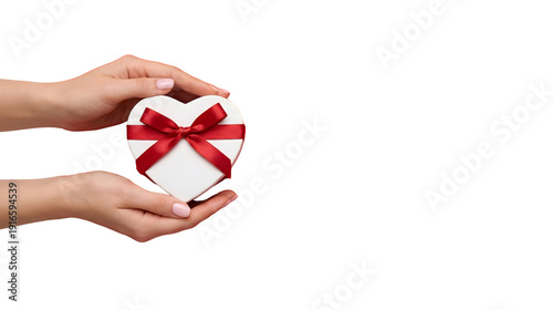 Woman's Hands Holding Heart Shaped Gift Box with Red Ribbon Isolated on White
