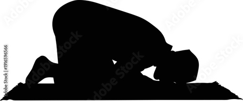 Black Silhouette of a Person Praying on a Prayer Mat