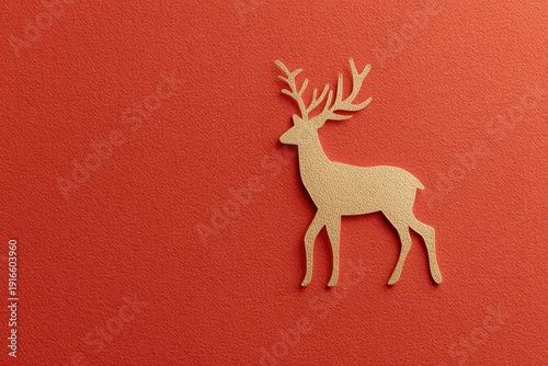 Elegant silhouette of deer against vibrant red background, showc