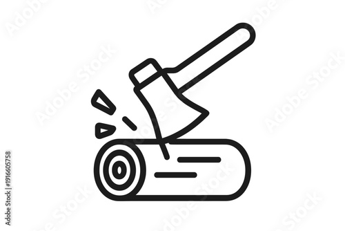 Manual labor concept showing an axe chopping a large piece of firewood
