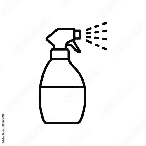 A spray bottle releasing a mist of liquid particles into the air