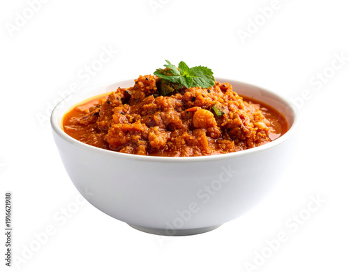 Savory bowl of chili with chunky beans and herbs in white ceramic dish