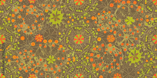 Intricate floral pattern with orange and green hues on a brown background