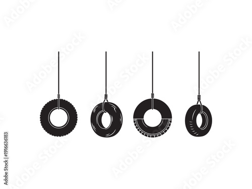 Four tires hanging on strings isolated on white background, recreation equipment set