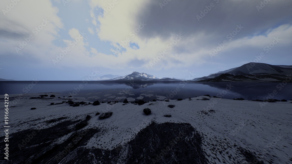 Obraz premium A tranquil landscape unfolds with majestic mountains reflecting in calm waters under a cloudy sky. The serene shoreline adds to the beauty, creating a peaceful atmosphere for nature lovers.