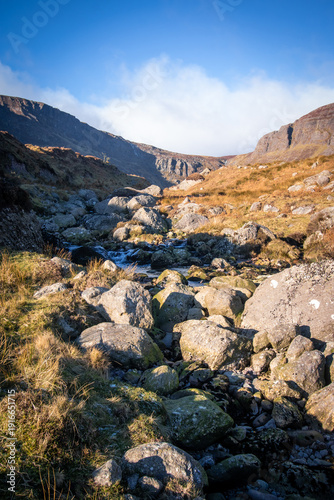 Stream leading into the mountains of Mahon Falls in Ireland