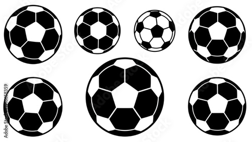 Collection of soccer balls arranged in a grid pattern on a plain background from a direct viewpoint