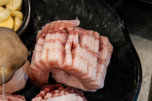 close-up of fresh pork belly ready to be roasted