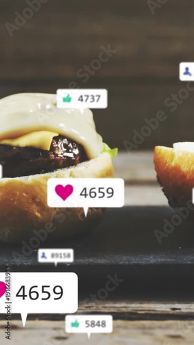Vertical video: Pale sauce pouring onto burger, coating cheese, spawning badges showing engagement