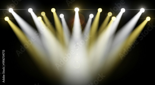 Multiple stage lights shining brightly on a dark background with warm and cool beams