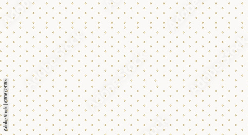 Alt text: A light beige background with a pattern of small, evenly spaced gold dots. The design is simple and elegant, conveying a subtle, refined tone.