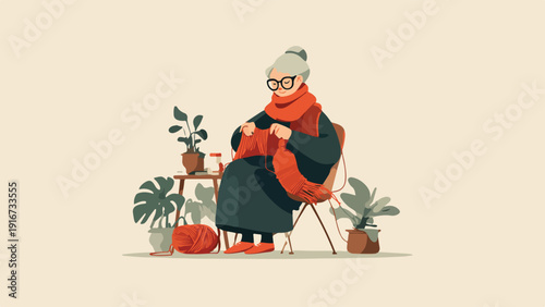 An elderly woman with grey hair and glasses knits with orange yarn while sitting in a chair