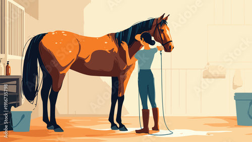 A person in boots washes a brown horse in a stable with a hose and bucket