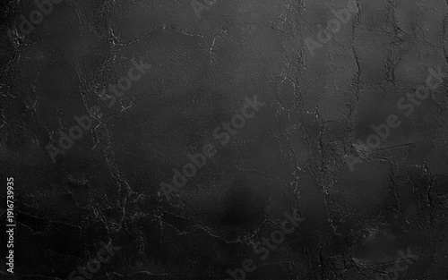 Black old concrete wall texture background. Close up retro plain black color cement wall background texture.