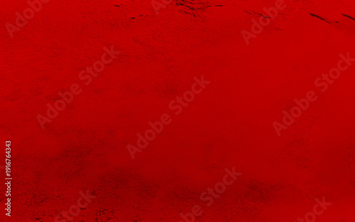 Abstract red grunge decorative stucco background.  Rough stylized texture banner with copy space.