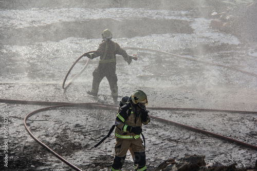 Wallpaper Mural Fire fighting and extinguishing operations with diffuser and water hose Torontodigital.ca