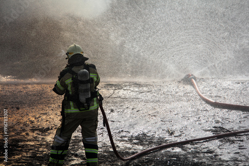 Wallpaper Mural Fire fighting and extinguishing operations with diffuser and water hose Torontodigital.ca