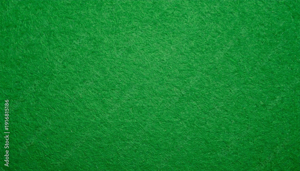 Fototapeta premium Close‑up of green felt textured fabric surface