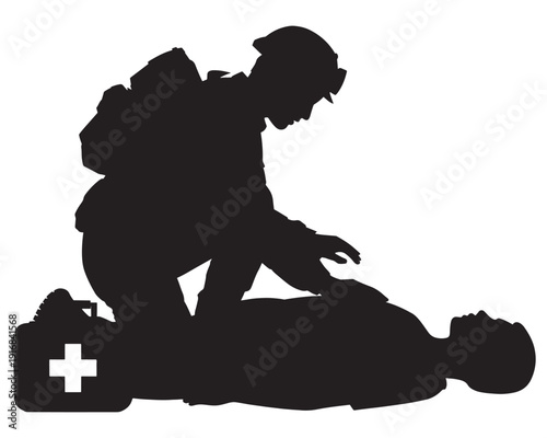 Silhouette shows rescuer kneeling beside person receiving CPR with first aid kit nearby