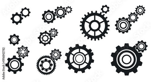A collection of black gear icons on a white background representing machinery and engineering