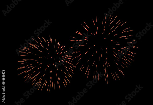 Red firework sparkling on black background for celebration and anniversary