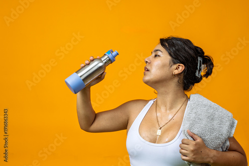 Tablou pe pânză Woman hydrating after intense exercise