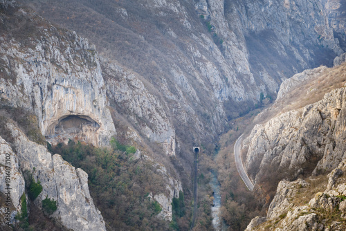 Sicevacka gorge (klisura), road, railway and massive cave from a impressive viewpoint of narrow canyon