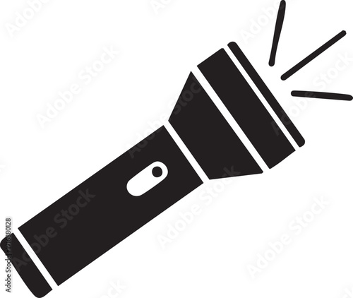 A black flashlight shining brightly in a dark environment viewed from an angle