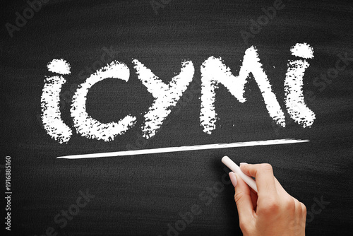 Wallpaper Mural ICYMI text written in chalk on a textured blackboard with a hand holding a chalk stick. Acronym for In Case You Missed It, used for highlighting important news or updates Torontodigital.ca