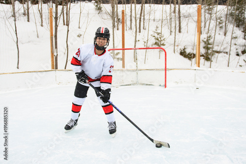 Photography Ice hockey teen play hockey outside in uniform