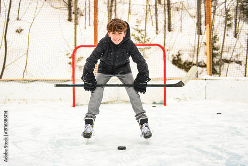 Photography Ice hockey teen play hockey outside in winter