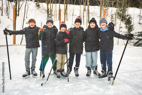 Photography Ice hockey group of teen play hockey outside in winter