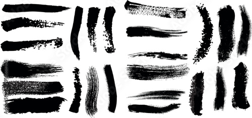 A collection of black brush strokes on a white background showcasing various textures and line styles in a grid pattern