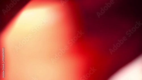 film burn transition with red and orange light leaks, ideal for editing effects.