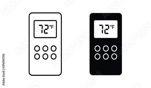 Black and white remote controls with temperature display on screen