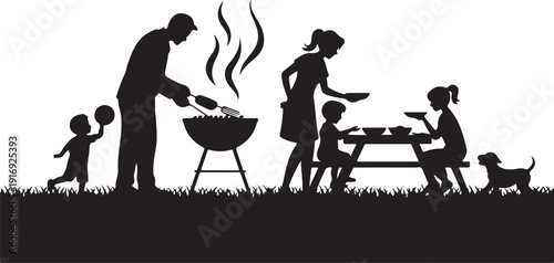 Family barbecue with children and dog in silhouette