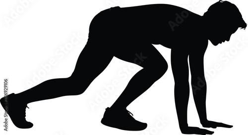 Athlete poised at starting line in dynamic running position