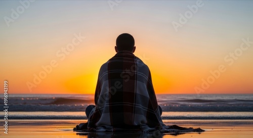 Serene Individual Meditating on Beach at Sunrise with Colorful Horizon