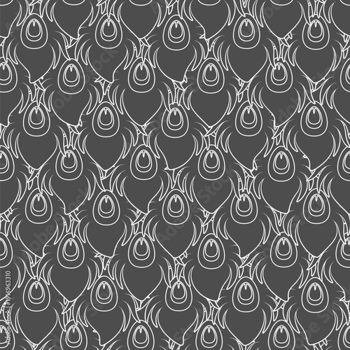 Seamless pattern of peacock feathers. Vector background.