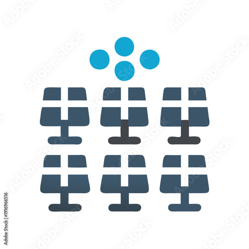 Modern conference room setup with audience seating and a digital display area