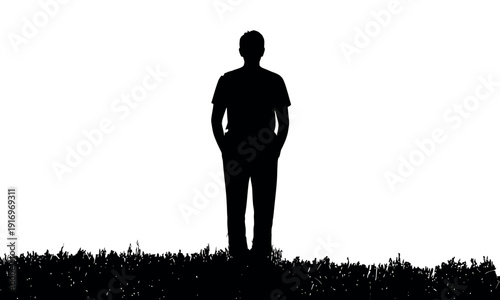 Full body silhouette of a man standing on a grassy ground, facing forward with hands in pockets, 