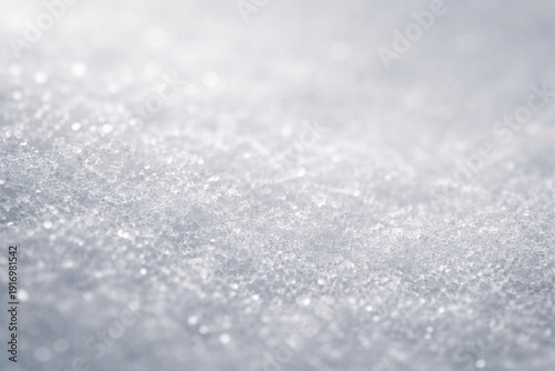 High-detail macro of ice crystals with cool tones and subtle sparkle, ideal for winter themes, clean textures, and abstract backgrounds.
