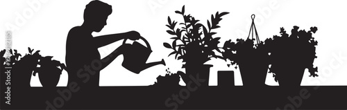 Silhouette of person watering plants in garden