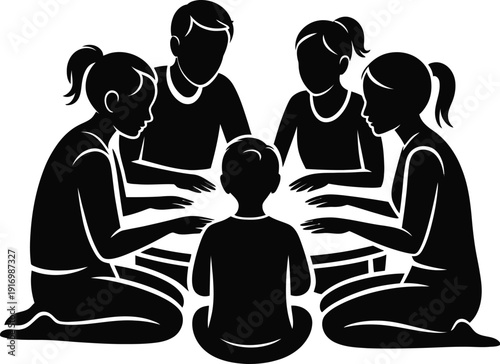 Silhouette of a family gathered around a table for Iftar meal during the holy month of Ramadan