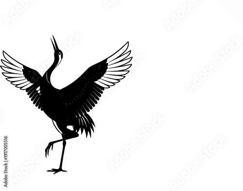 A black silhouette of a crane with wings spread wide, standing on one leg