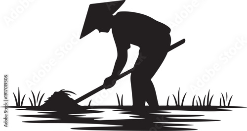 Person Planting Rice in Water with a Hat and Tool