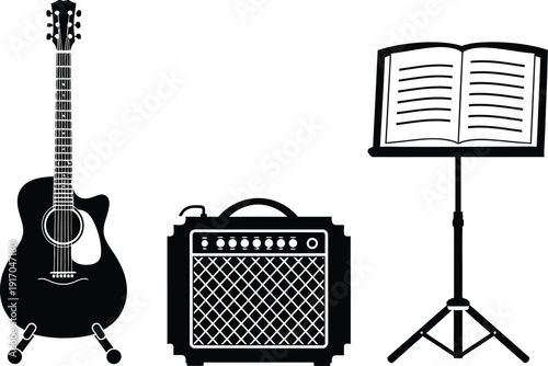 Musical instruments and accessories setup with  acoustic guitar on a stand, a guitar amplifier, and a music stand.