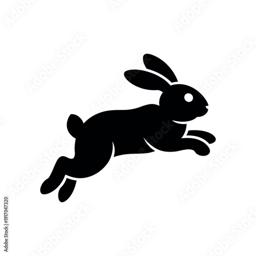 A black silhouette of a rabbit in motion